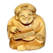 японская нецке из слоновой кости Дайкоку, один из Семи Богов Счастья